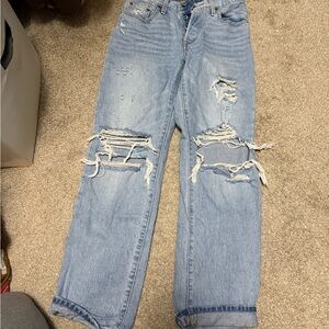 Distressed Blue Denim Jeans